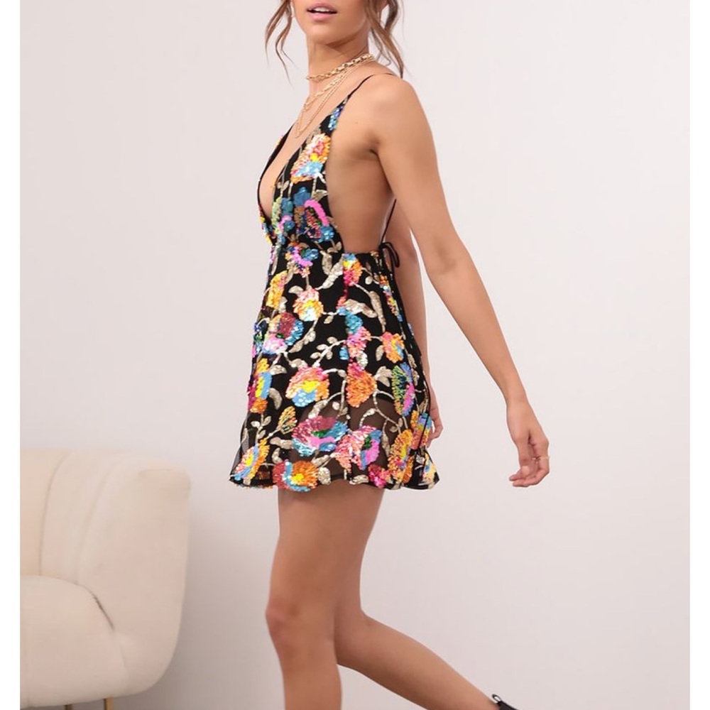 Lucy in the Sky Multicolor low cut mini dress/romper.